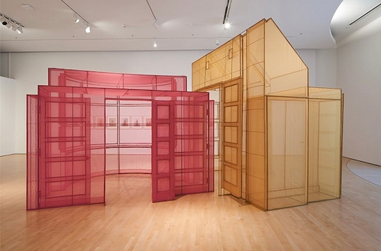 An image depicting Do Ho Suh's artwork, a pink and a yellow house