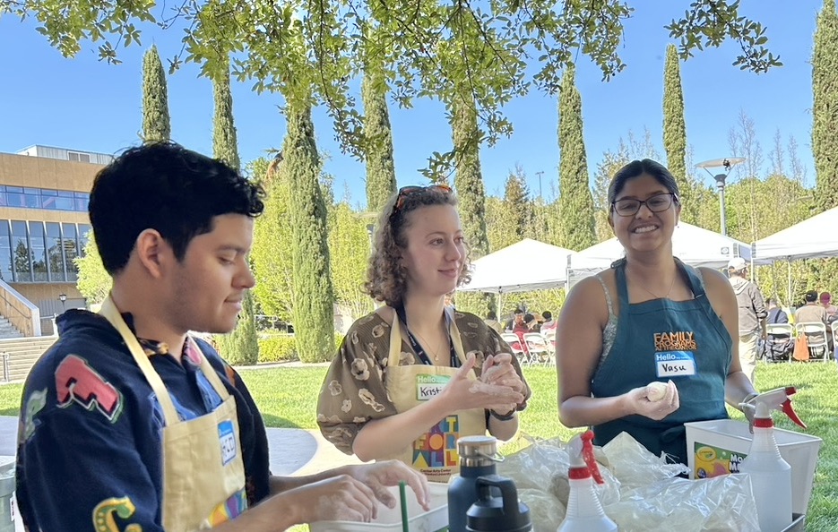 students outside the museum participating in an activity
