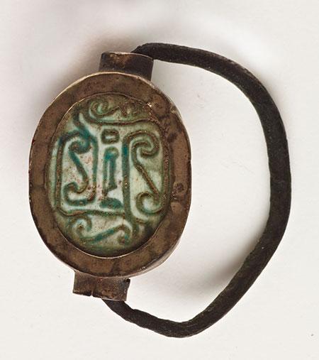 Artist unknown (Egypt), Scarab Attached to a Ring, nd. Metal and Egyptian faience or glazed stone. Stanford Family Collections, JLS.171812