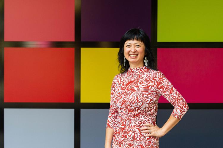 woman against colored squares backdrop