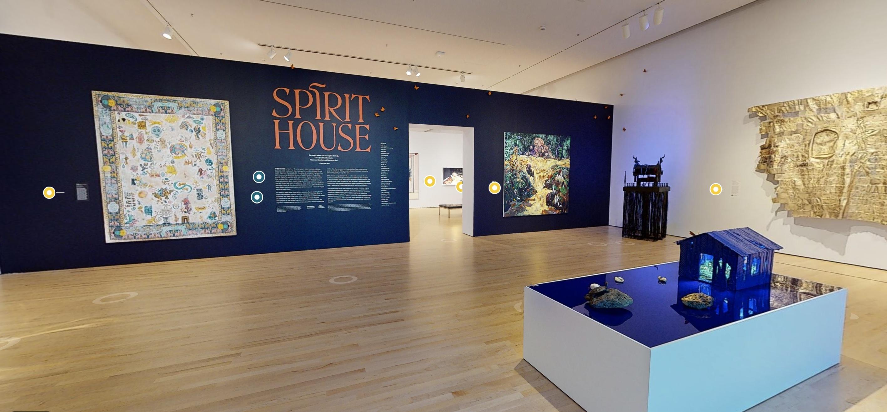 An image of a gallery depictung various artworks in a virtual tour